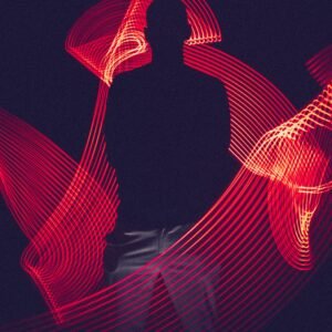 A silhouette of a person surrounded by artistic red light trails, creating a dynamic visual effect.